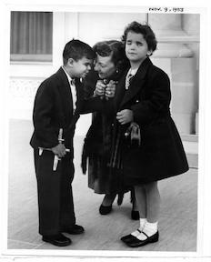 Mamie D. Eisenhower receives two blind children from the Lighthouse, (New York Association for the Blind). November 9, 1953.
