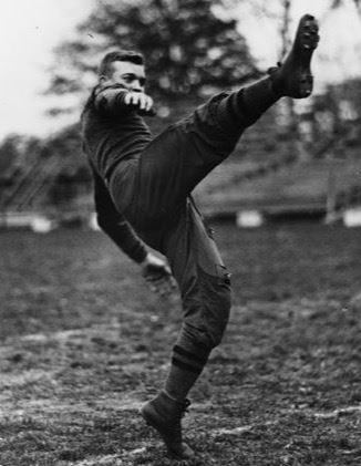 Ike punting for West Point football team